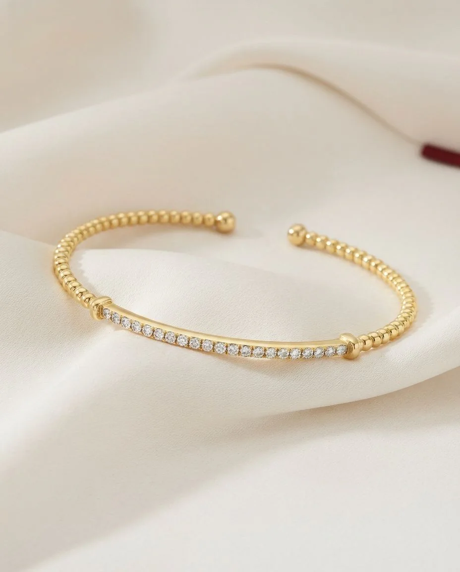 Armreif 14 Karat Gelbgold · drapiert