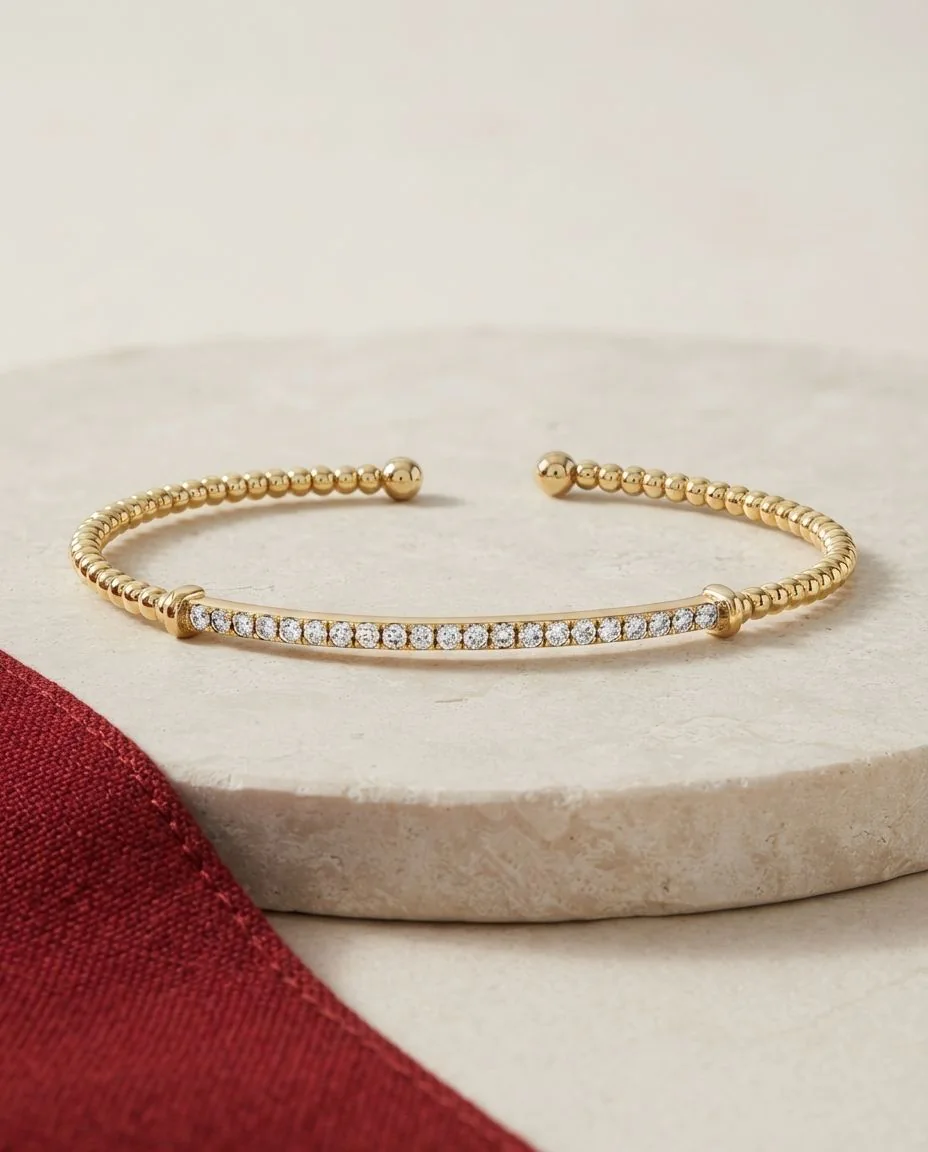 Armreif 14 Karat Gelbgold · drapiert
