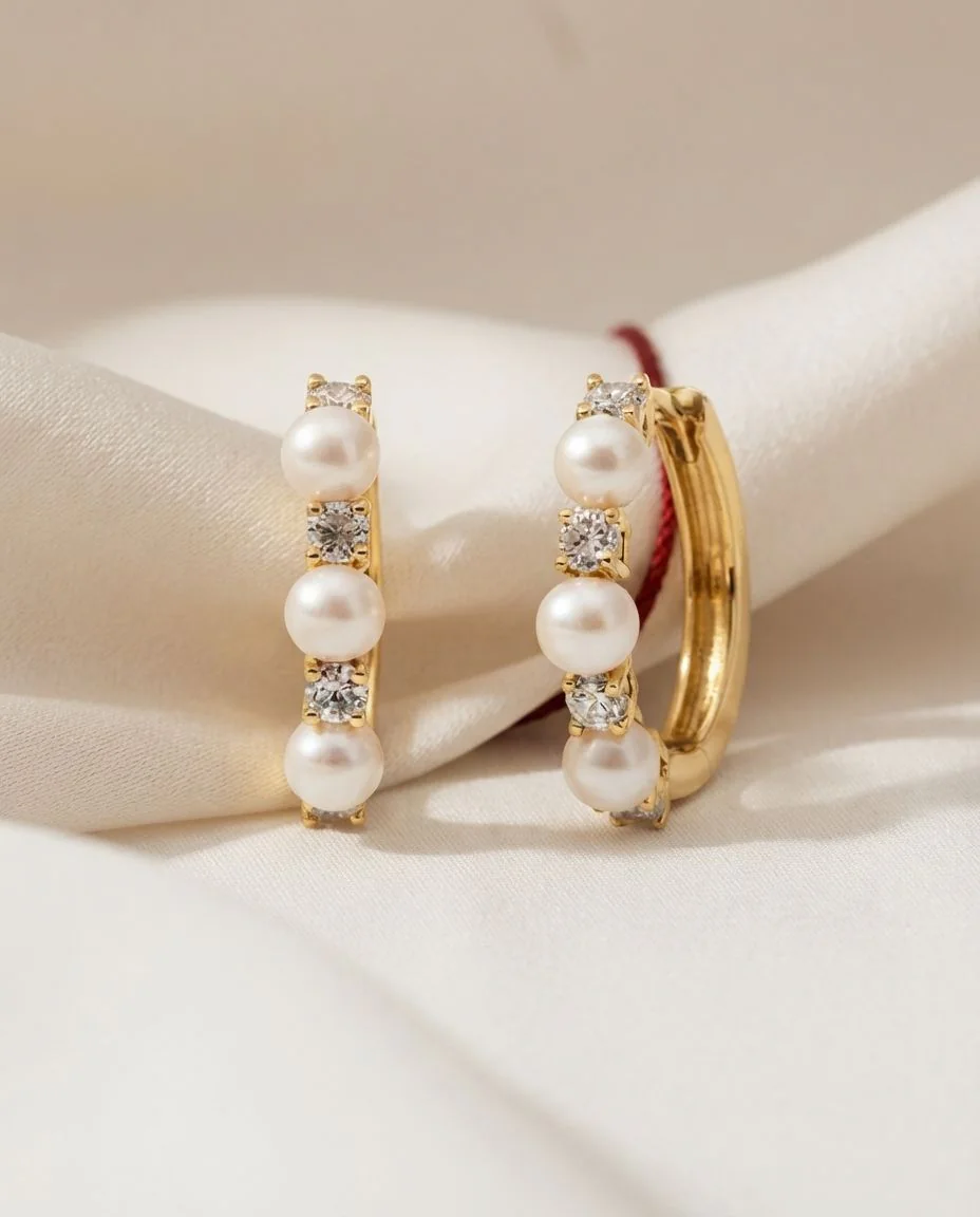 Creolen 18 Karat Gelbgold · drapiert