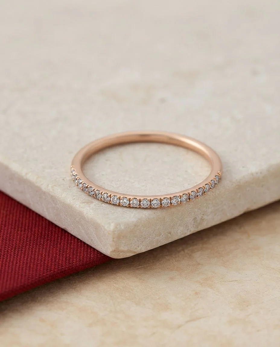 Ring 18 Karat Roségold · drapiert