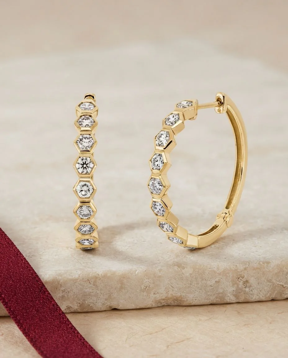 Creolen 14 Karat Gelbgold · drapiert