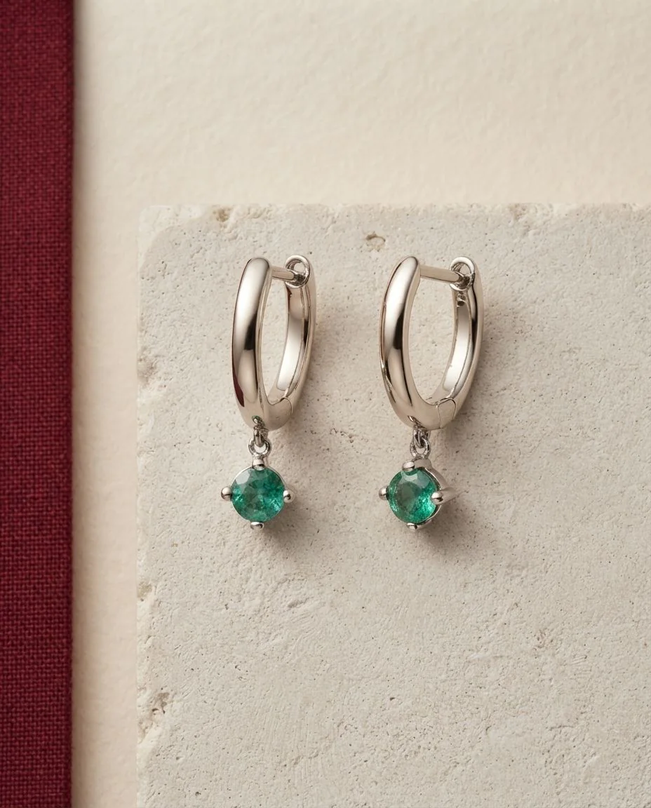 Ohrschmuck 18 Karat Weißgold · drapiert