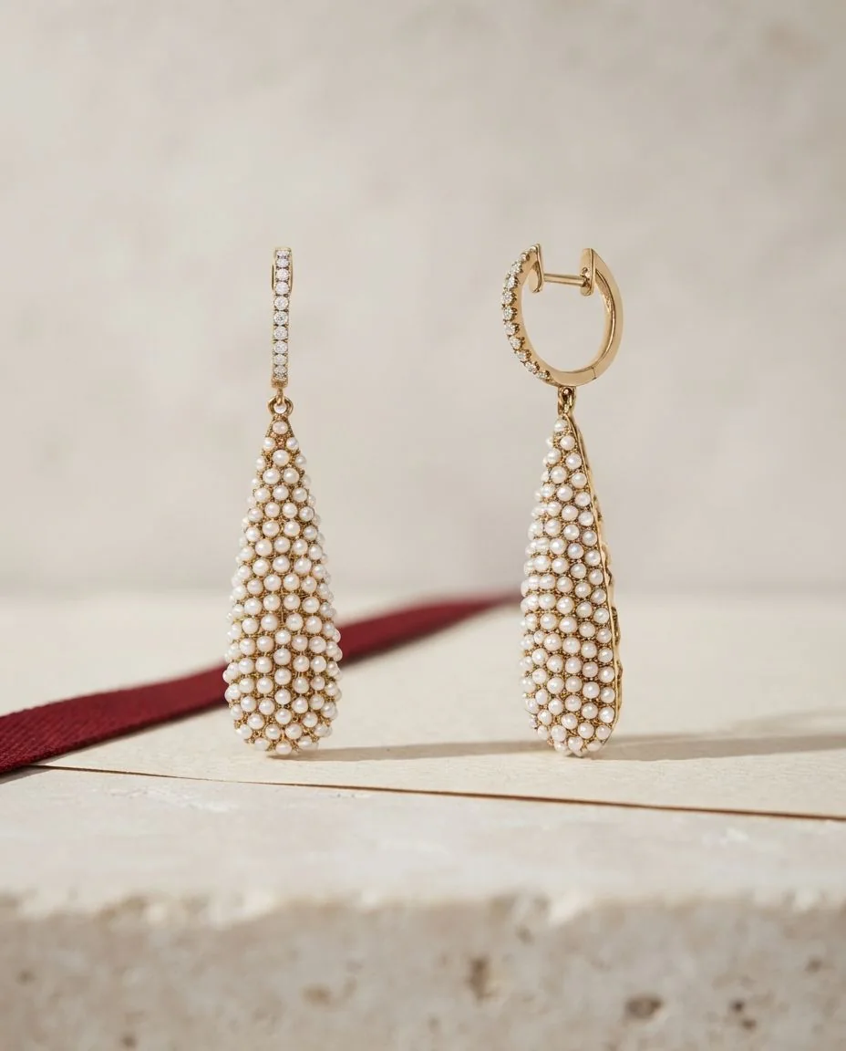 Ohrschmuck 18 Karat Gelbgold · drapiert