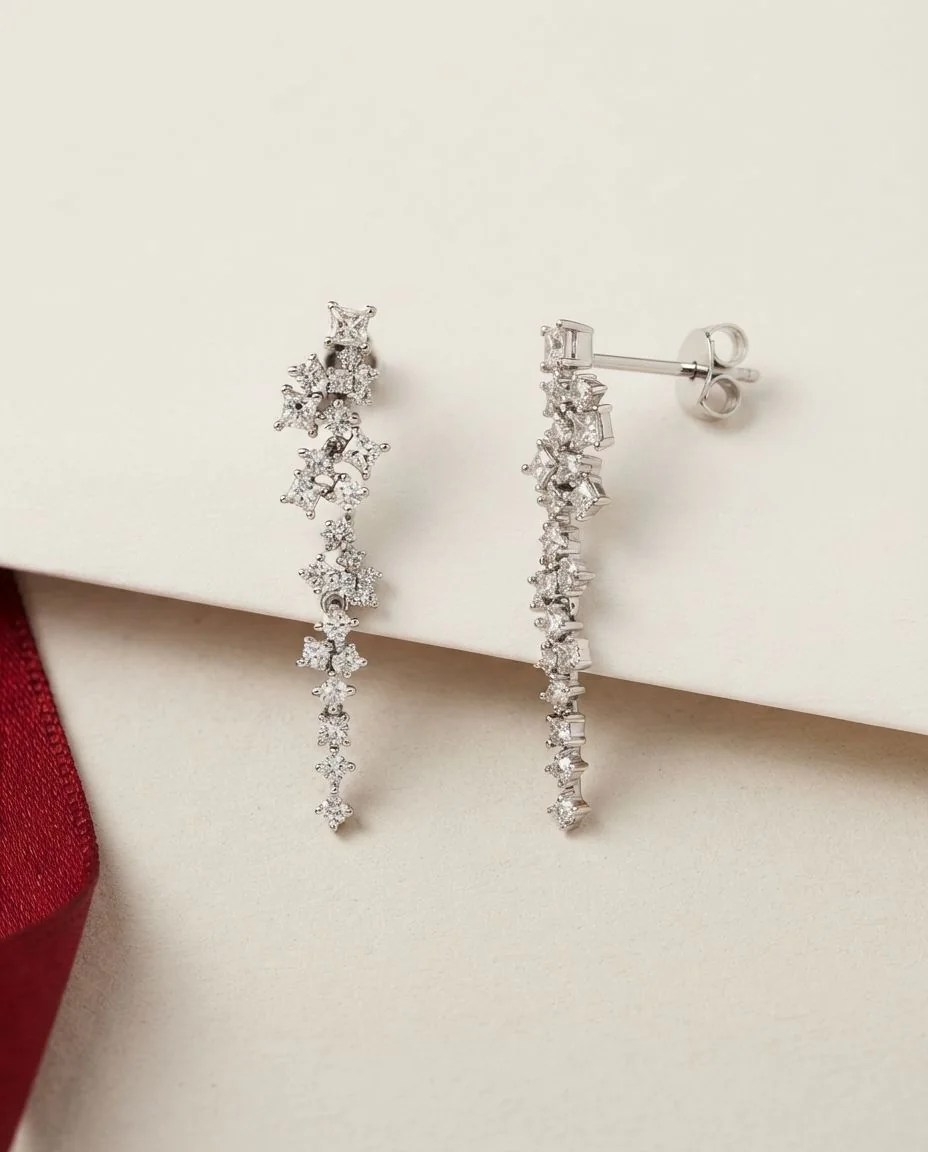 Ohrschmuck 14 Karat Weißgold · drapiert
