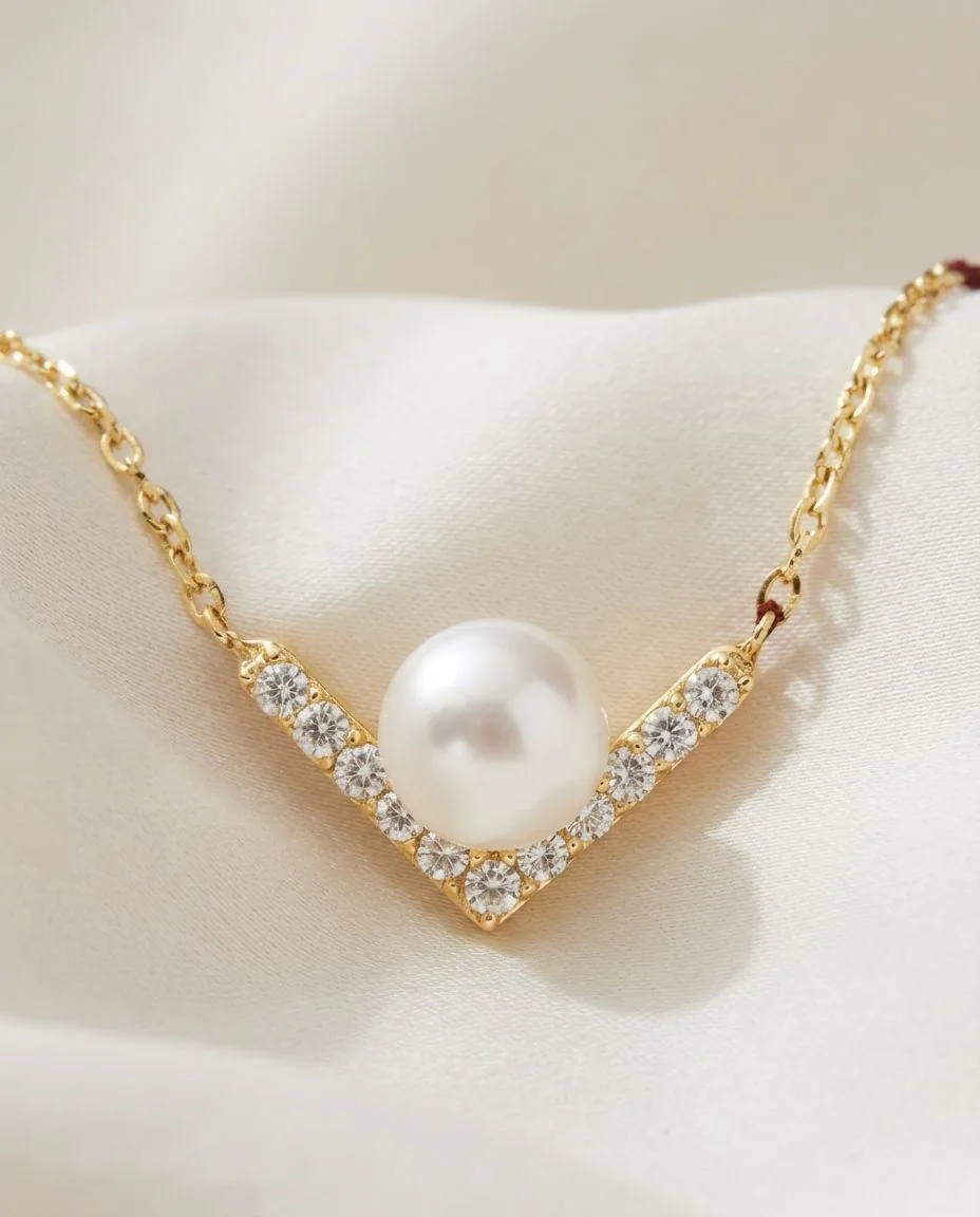 Collier 18 Karat Gelbgold, mit ZÖ 40 cm + 43 cm · drapiert