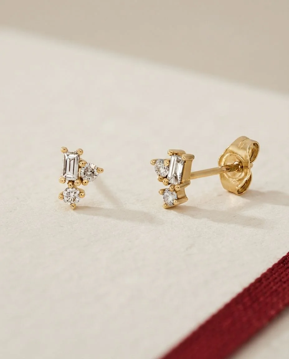 Ohrstecker 14 Karat Gelbgold · drapiert