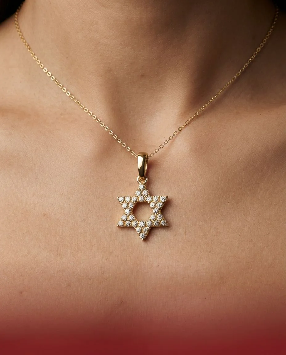 Anhänger 18 Karat Gelbgold Davidstern, mit Öse · getragen