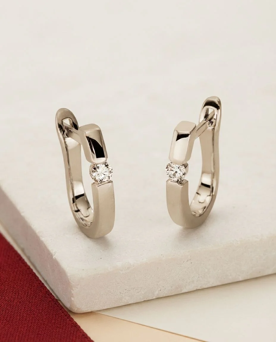 Creolen 18 Karat Gelbgold · drapiert
