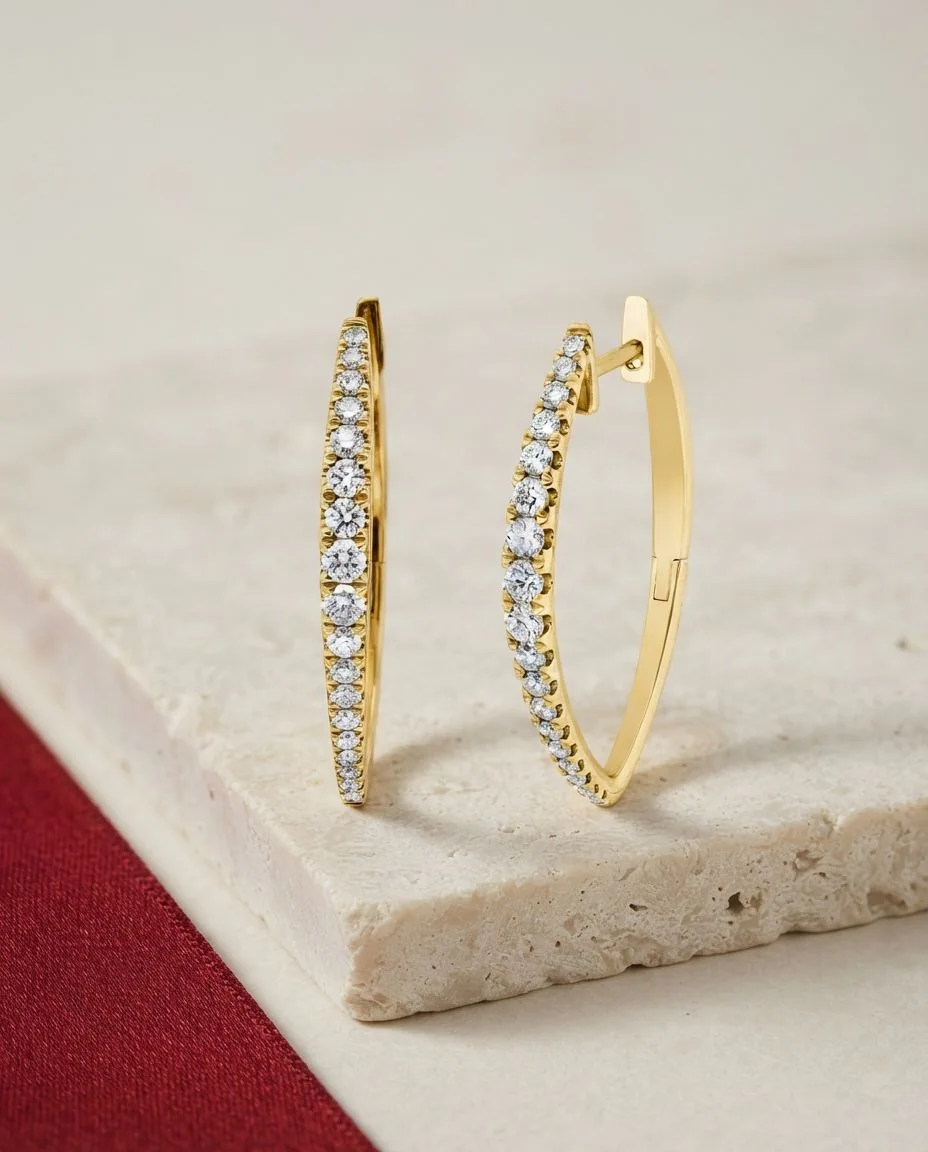 Creolen 14 Karat Gelbgold · drapiert