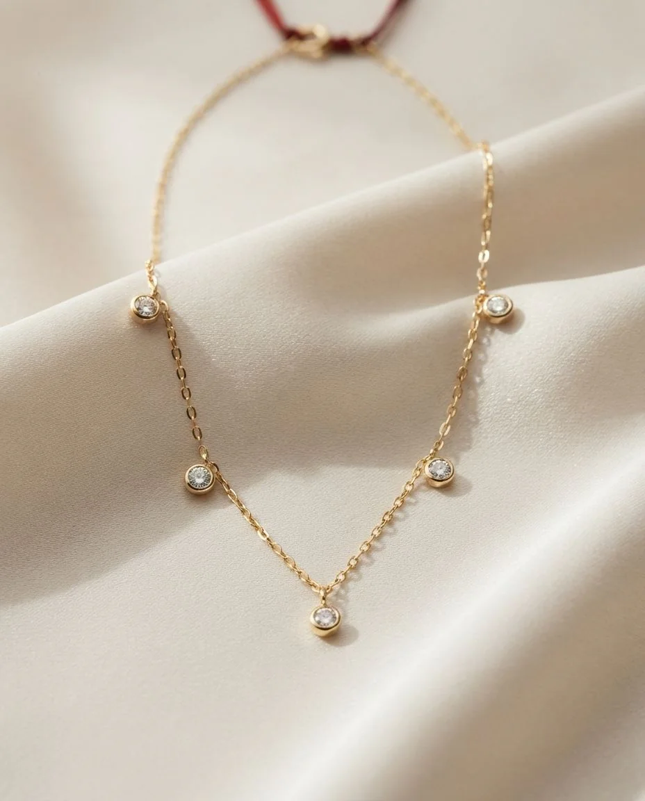 Collier 18 Karat Gelbgold · drapiert