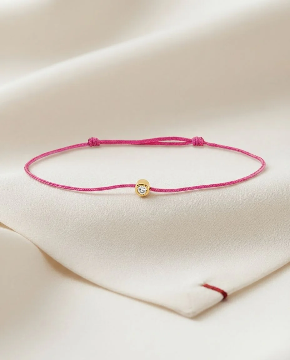 Armband 18 Karat Gelbgold, pink cord 15,5-19,5cm · drapiert