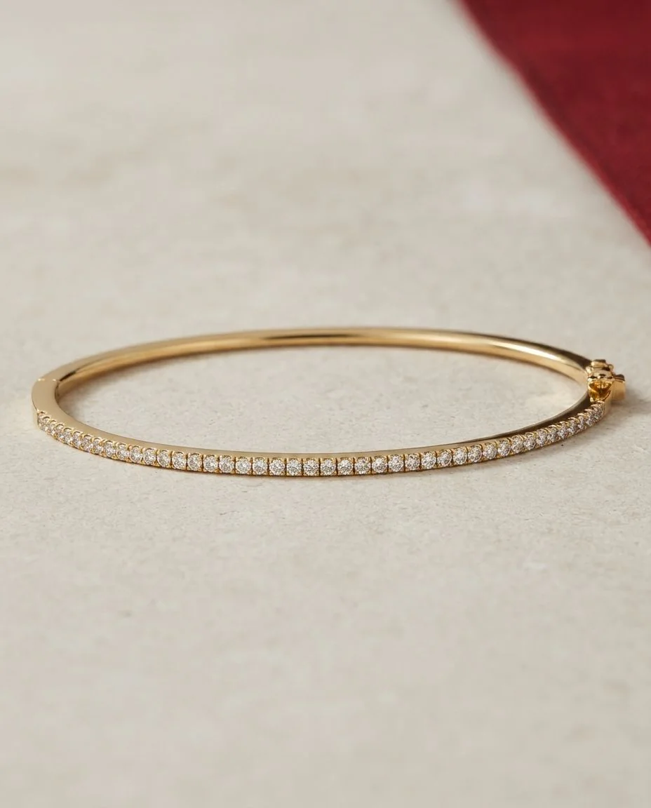 Armreif 18 Karat Gelbgold · drapiert