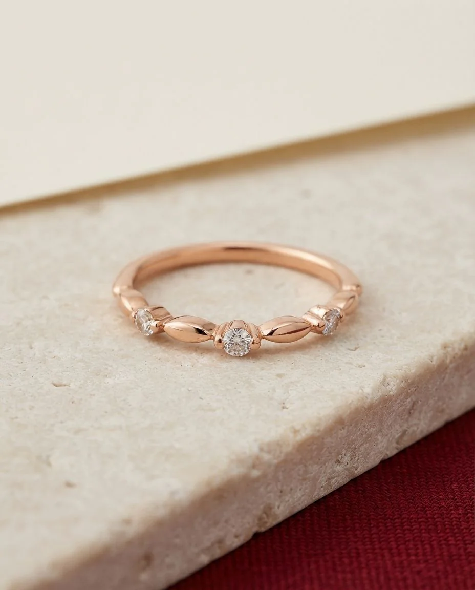 Ring 14 Karat Roségold · drapiert
