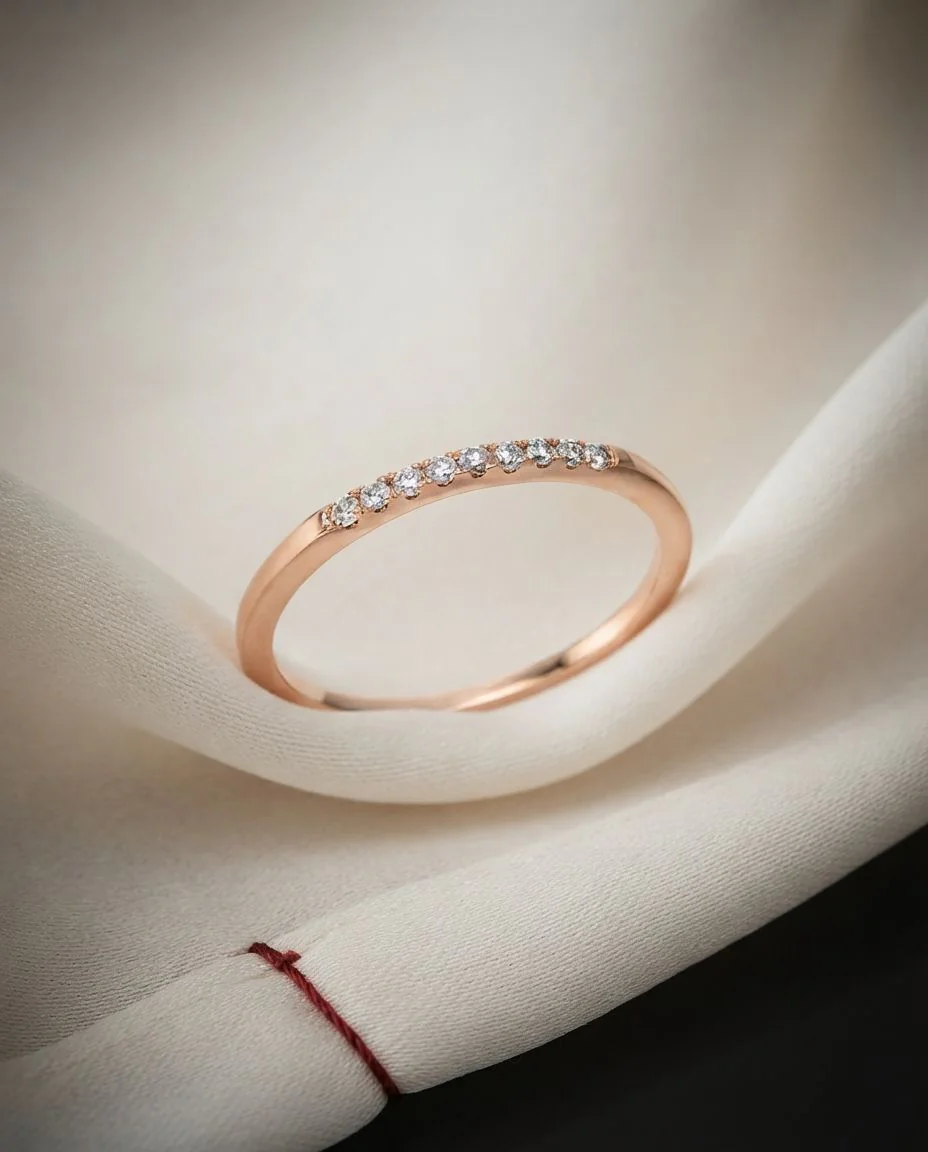 Ring 18 Karat Roségold · drapiert