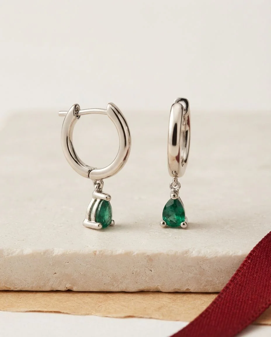 Ohrschmuck 18 Karat Weißgold · drapiert
