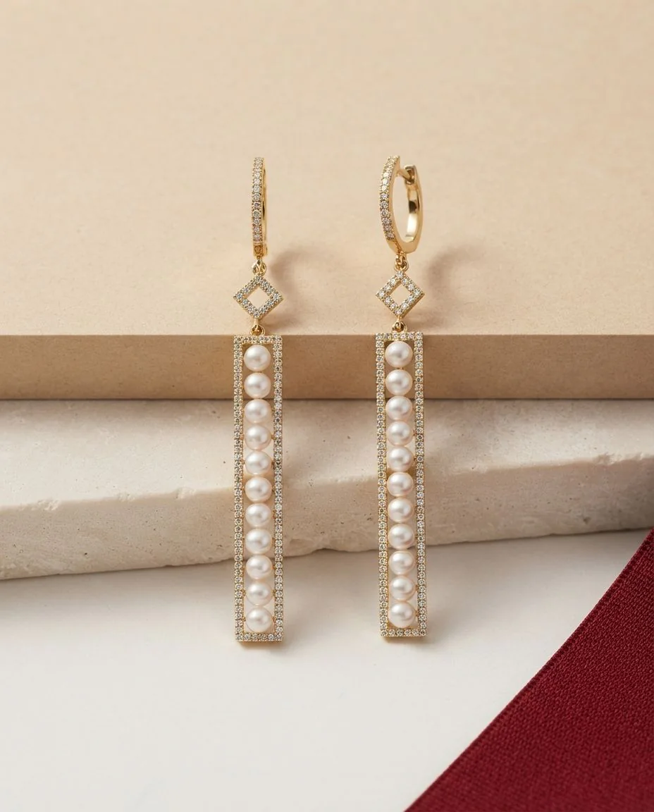 Ohrschmuck 18 Karat Gelbgold · drapiert
