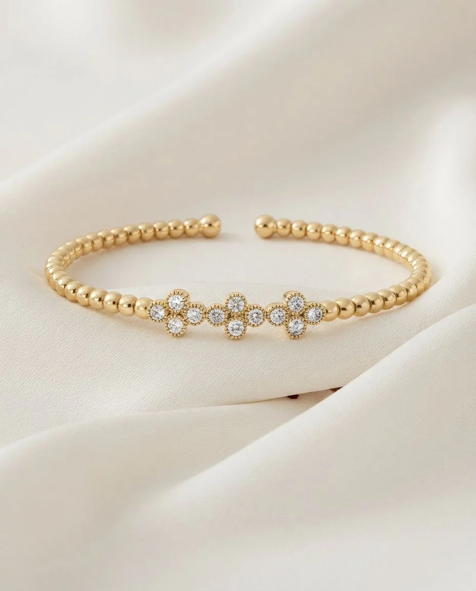 Armreif 18 Karat Gelbgold · drapiert