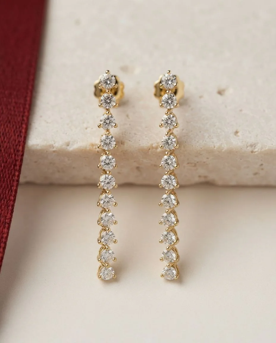 Ohrschmuck 18 Karat Gelbgold · drapiert