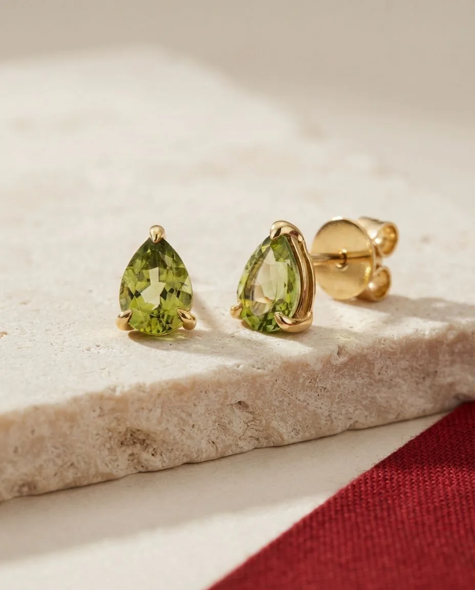 Ohrstecker 18 Karat Gelbgold · drapiert
