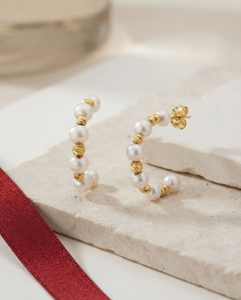 Ohrstecker 18 Karat Gelbgold · drapiert