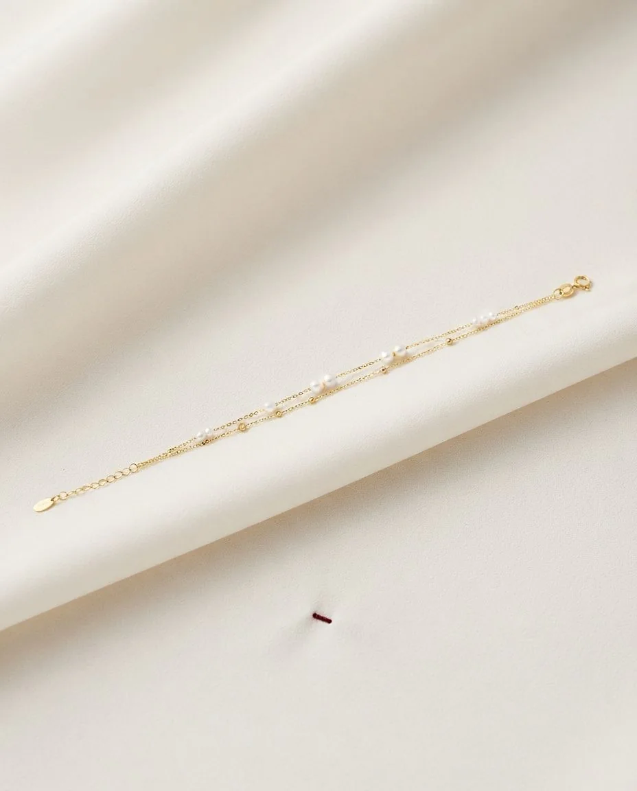 Armband 18 Karat Gelbgold, mit ZÖ 16 cm · drapiert