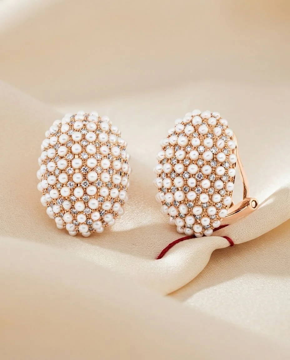 Ohrstecker 18 Karat Roségold · drapiert