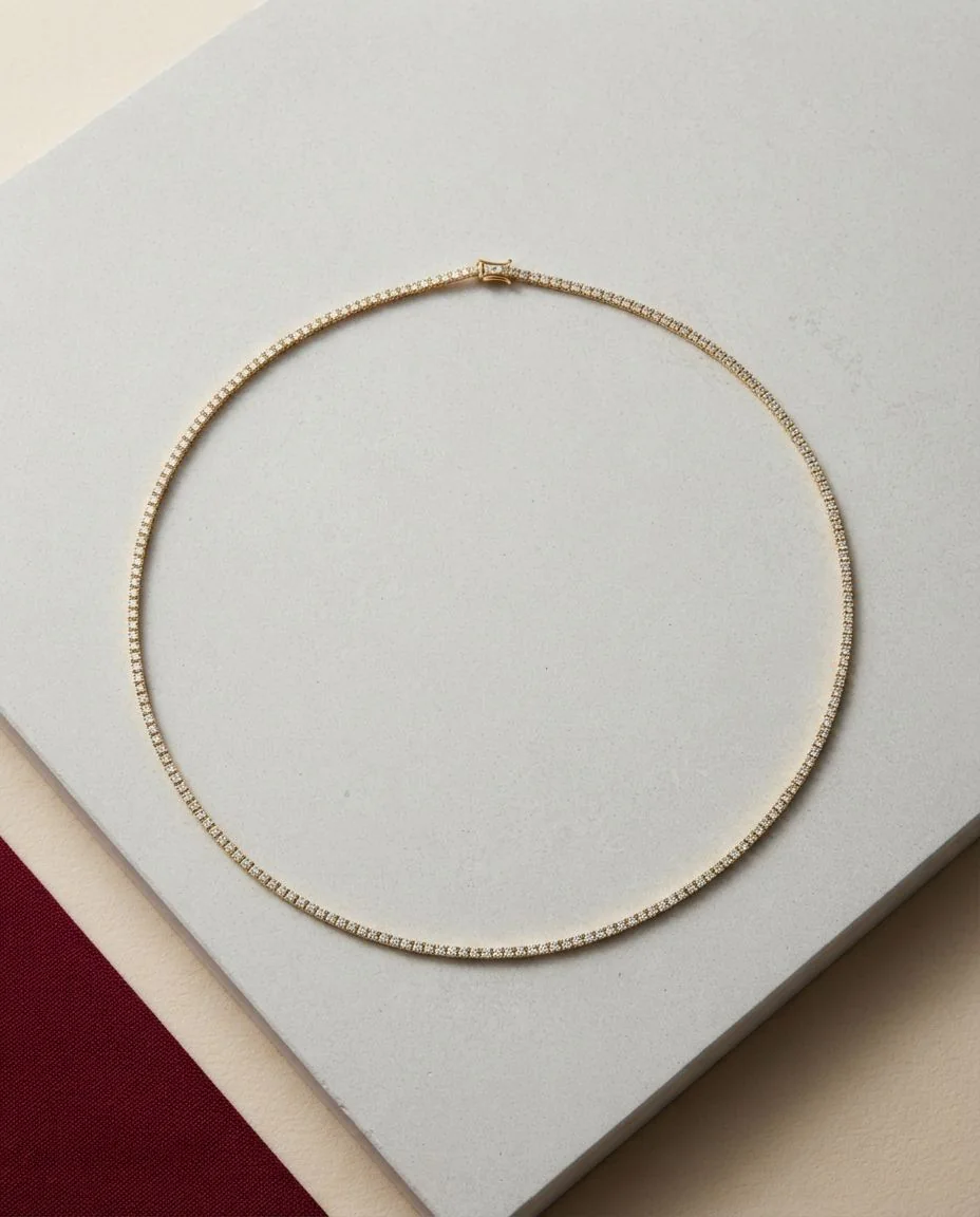 Collier 18 Karat Gelbgold · drapiert
