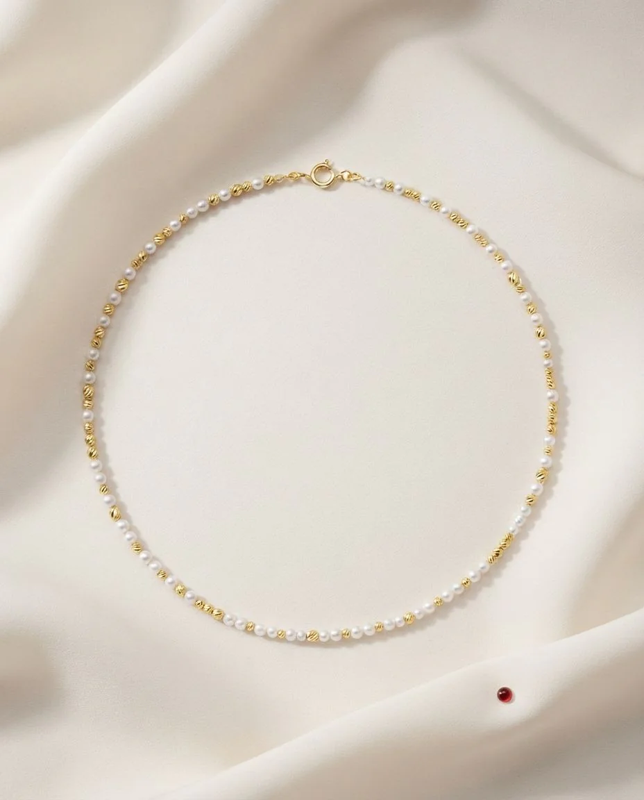 Collier 18 Karat Gelbgold · drapiert