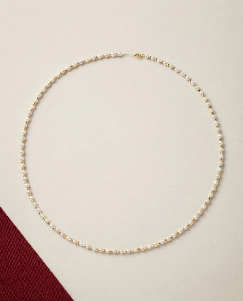Collier 18 Karat Gelbgold · drapiert