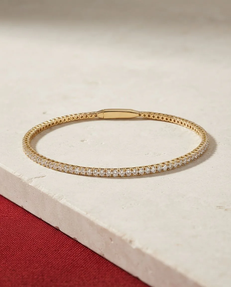 Armreif 18 Karat Gelbgold · drapiert