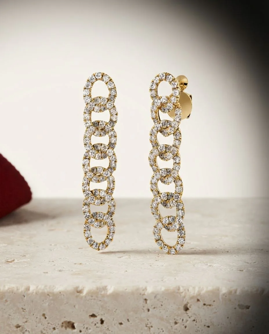 Ohrschmuck 18 Karat Gelbgold · drapiert