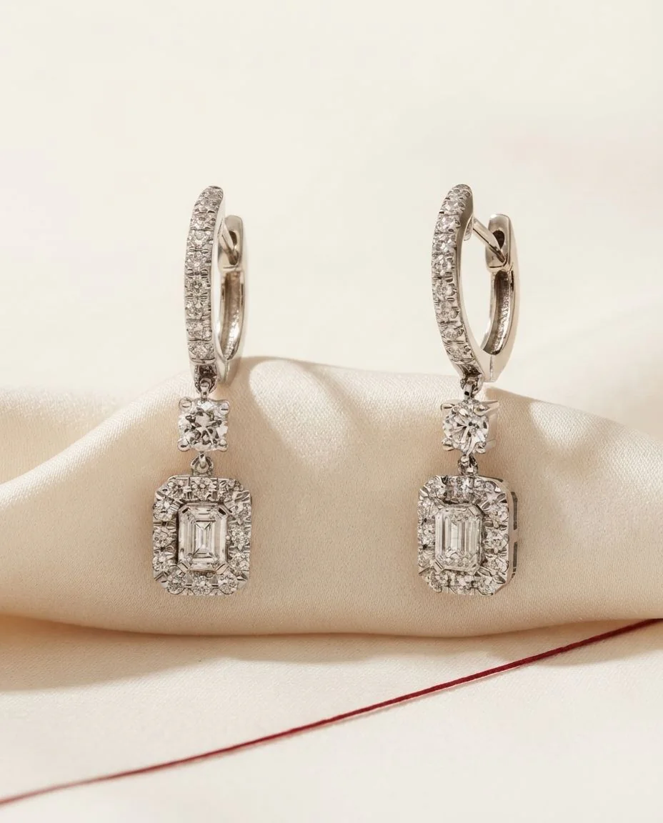 Ohrschmuck 14 Karat Weißgold · drapiert