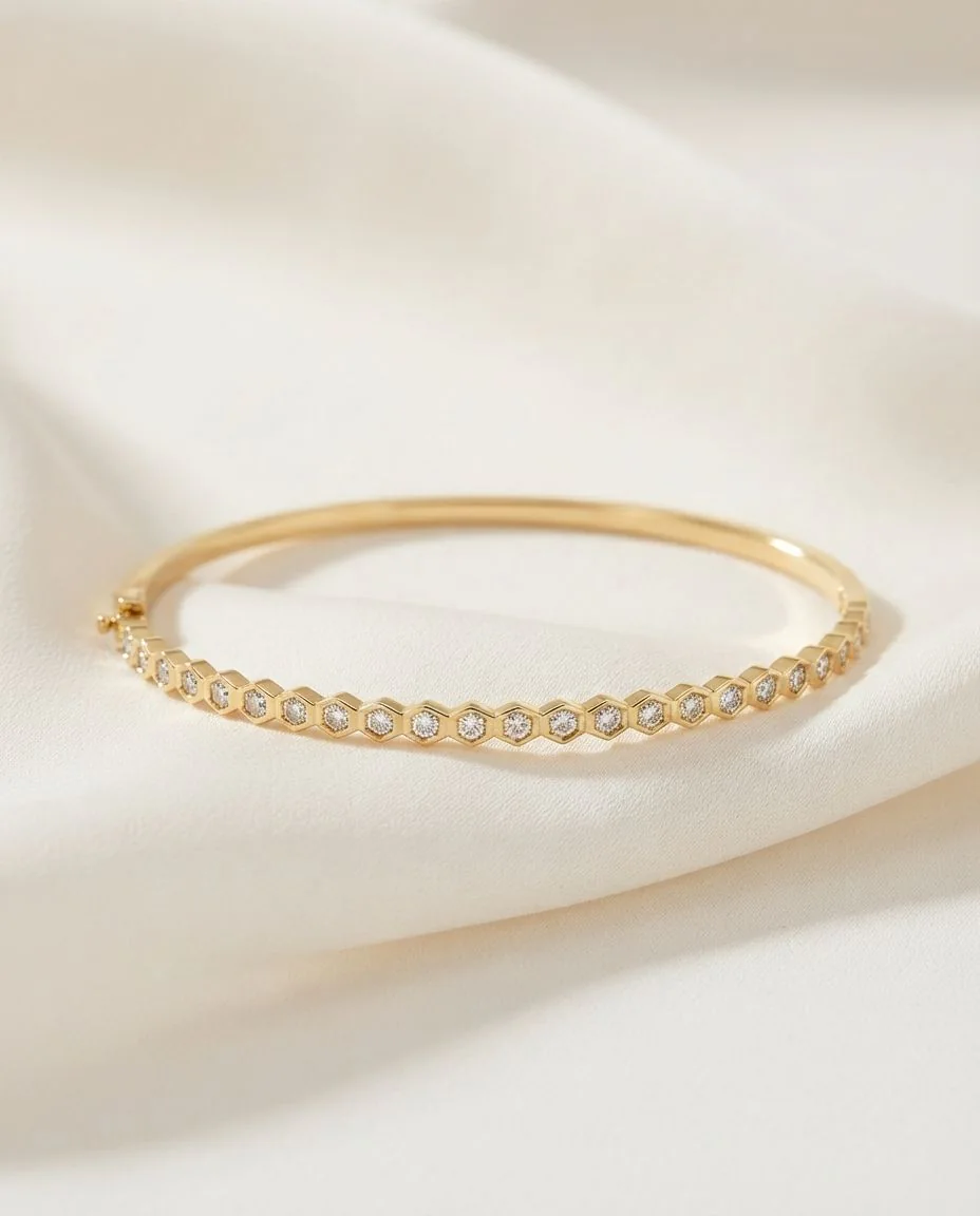 Armreif 18 Karat Gelbgold · drapiert