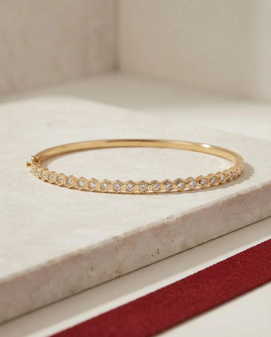 Armreif 18 Karat Gelbgold · drapiert