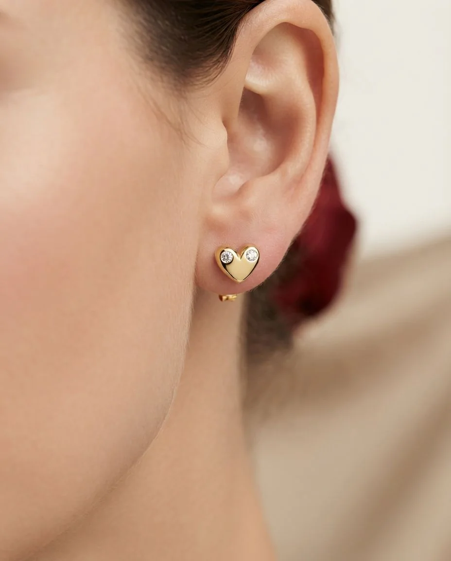 Ohrstecker 18 Karat Gelbgold Herz · getragen