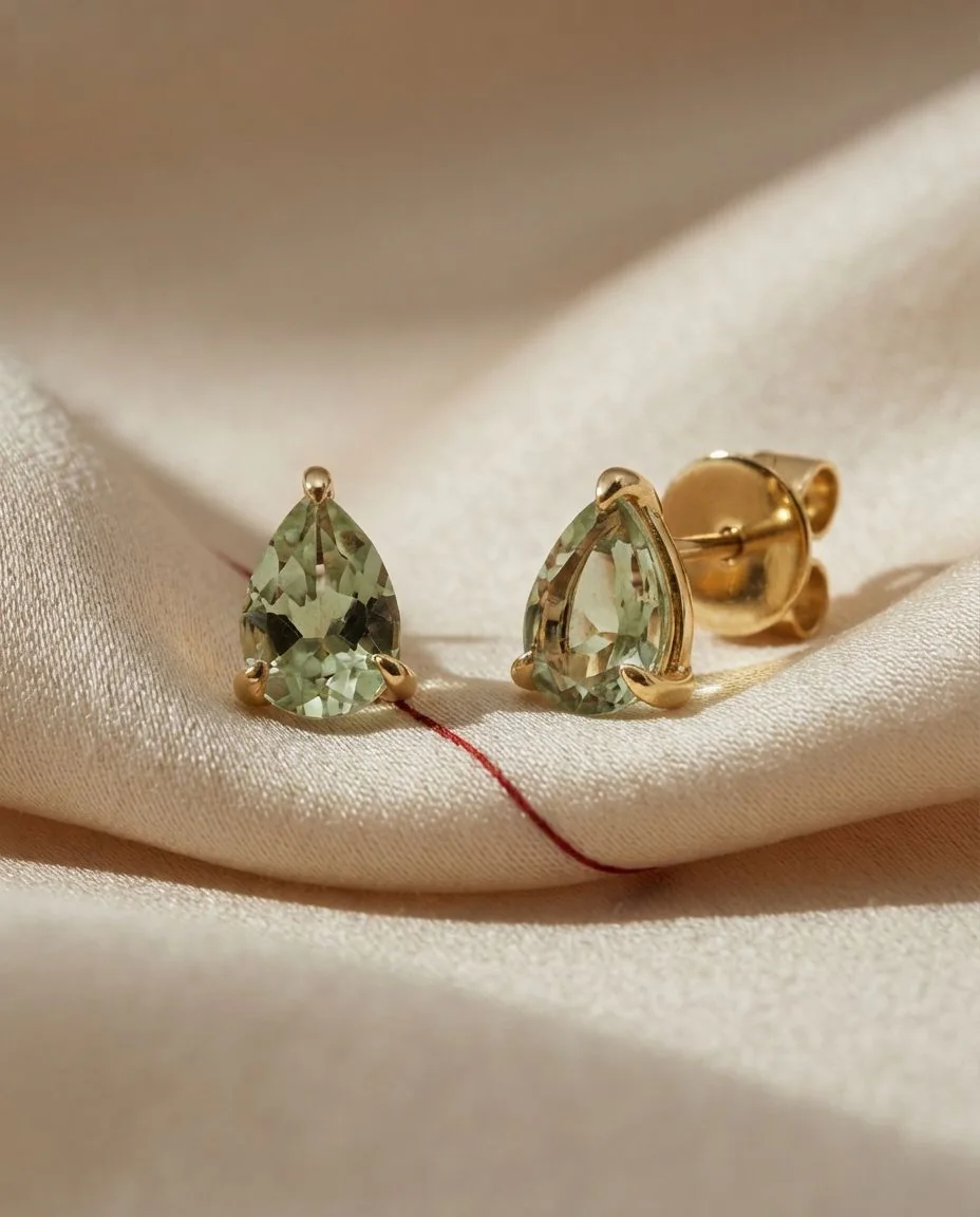 Ohrstecker 18 Karat Gelbgold · drapiert