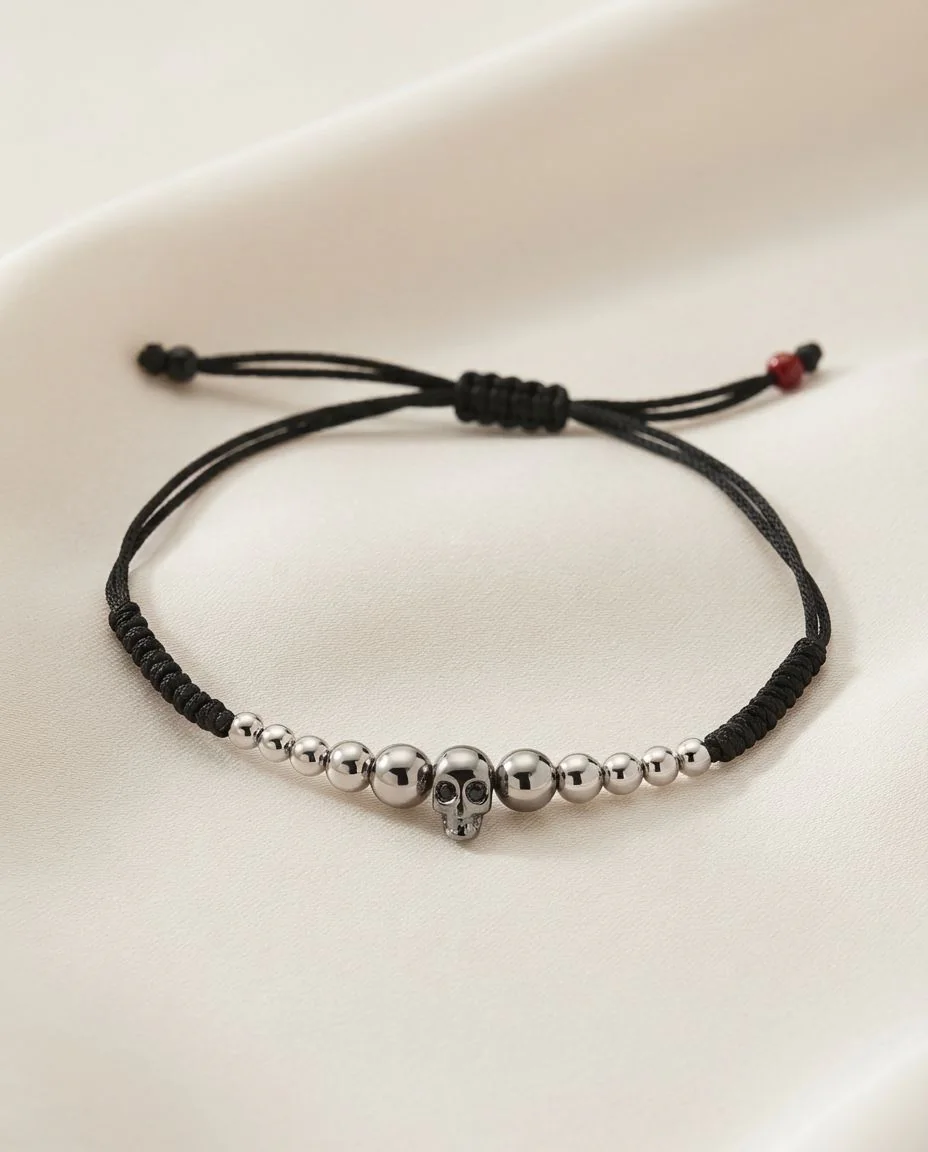 Armband 18 Karat Weißgold, teils schwarz rhodiniert · drapiert