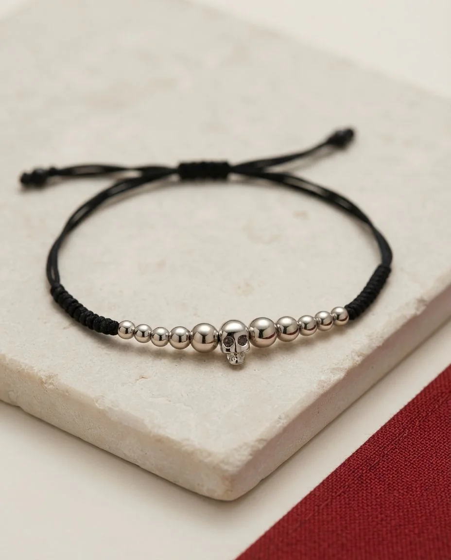Armband 18 Karat Weißgold, teils schwarz rhodiniert · drapiert