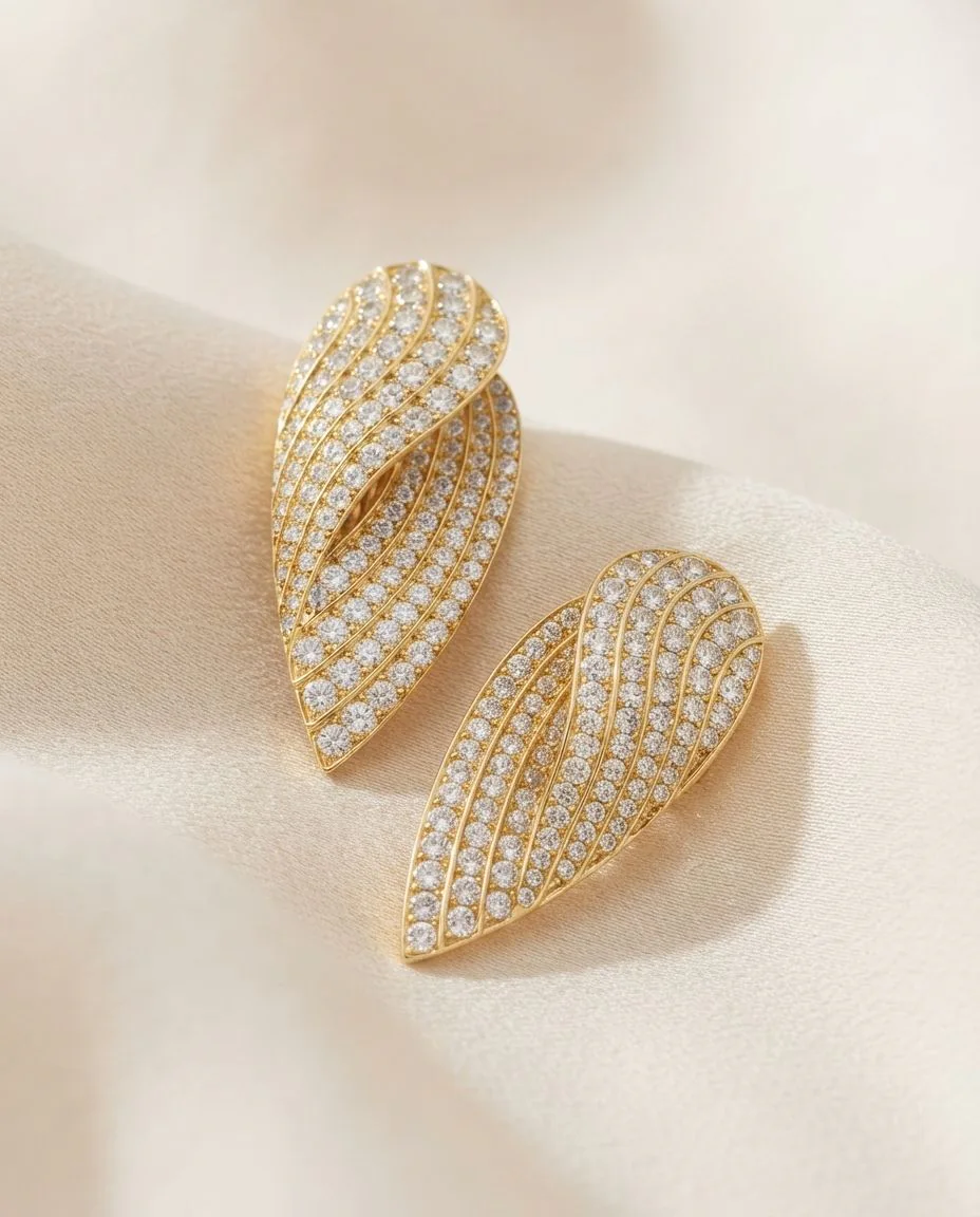 Creolen 18 Karat Gelbgold · drapiert