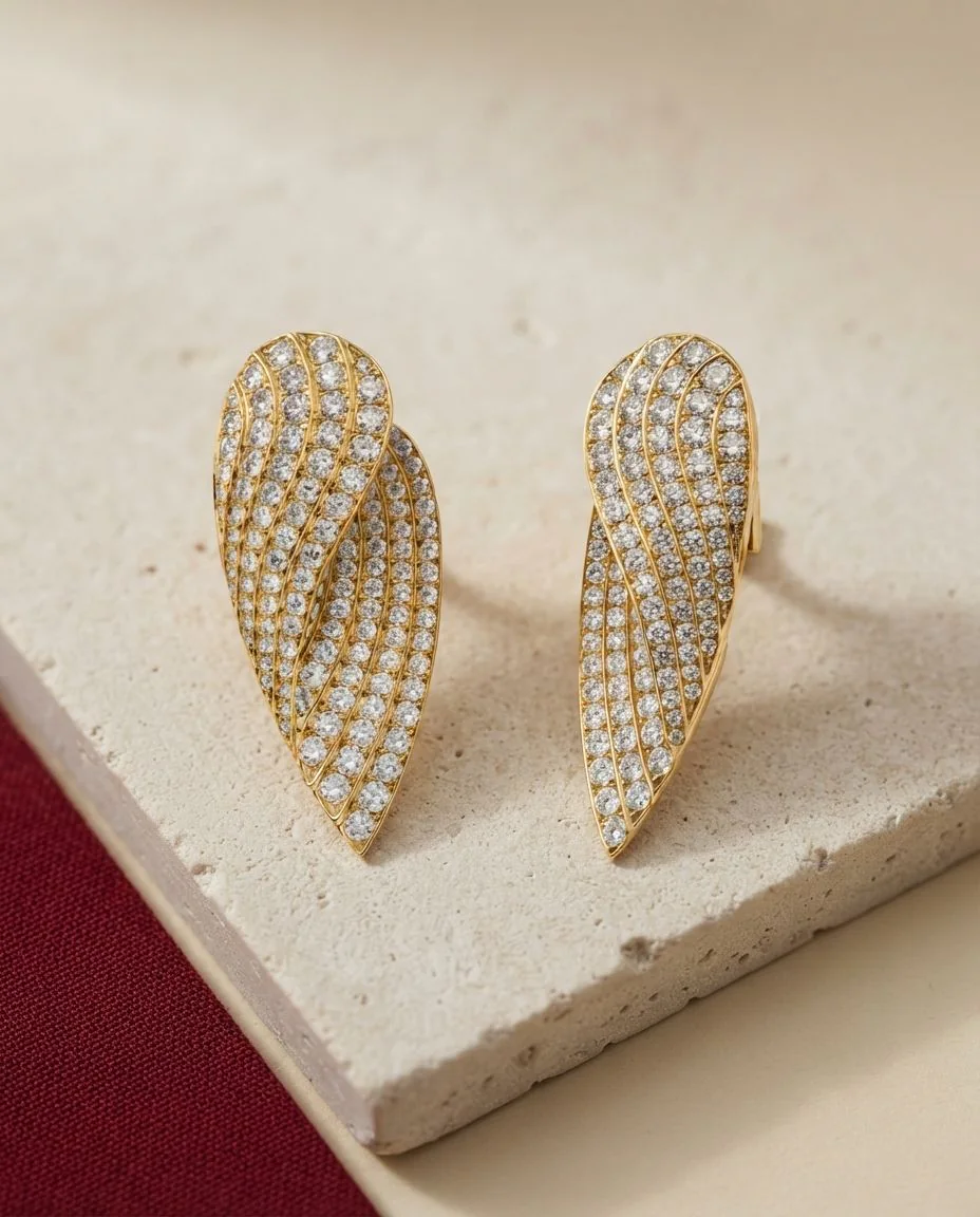 Creolen 18 Karat Gelbgold · drapiert