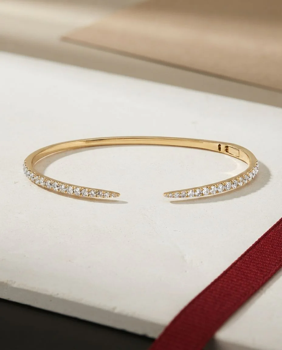 Armreif 18 Karat Gelbgold · drapiert