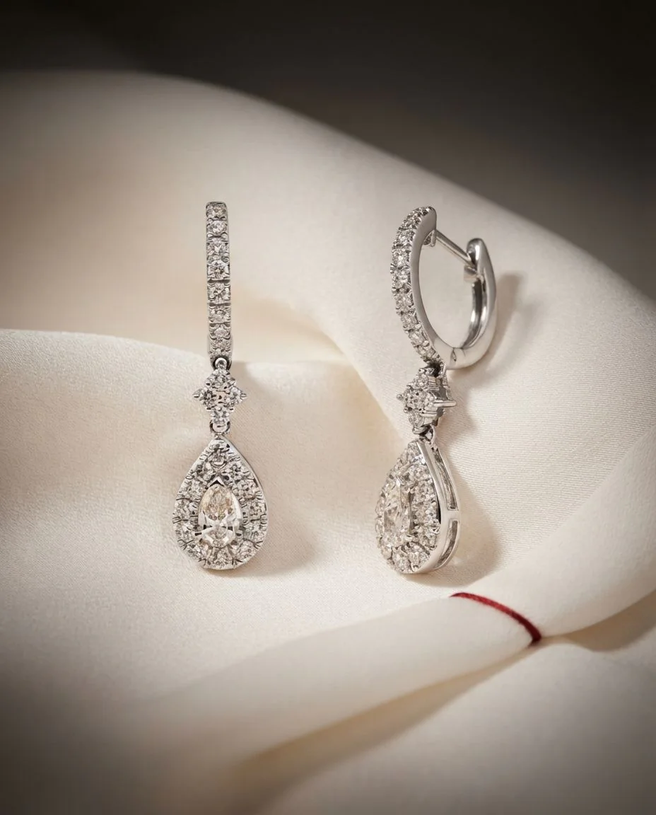 Ohrschmuck 14 Karat Weißgold · drapiert