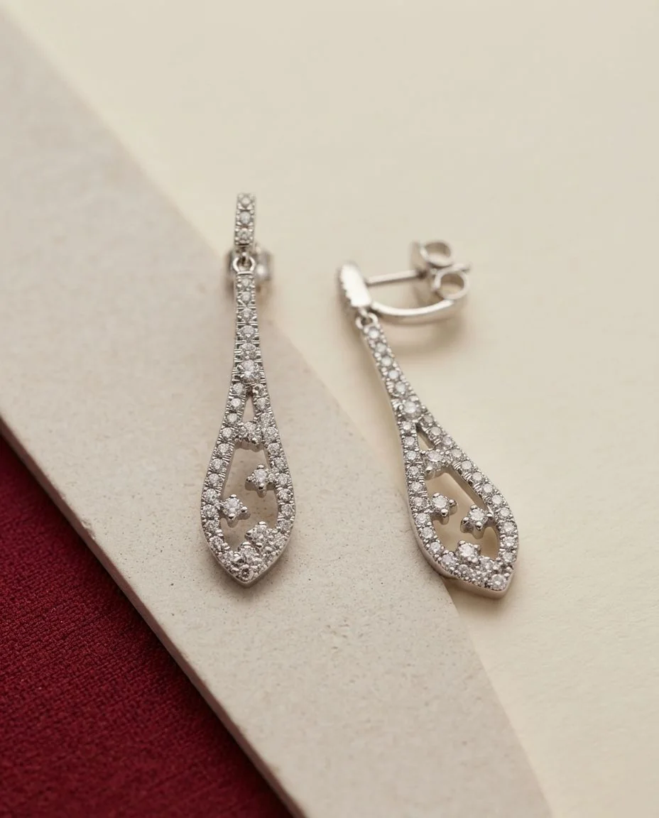 Ohrschmuck 18 Karat Gelbgold · drapiert