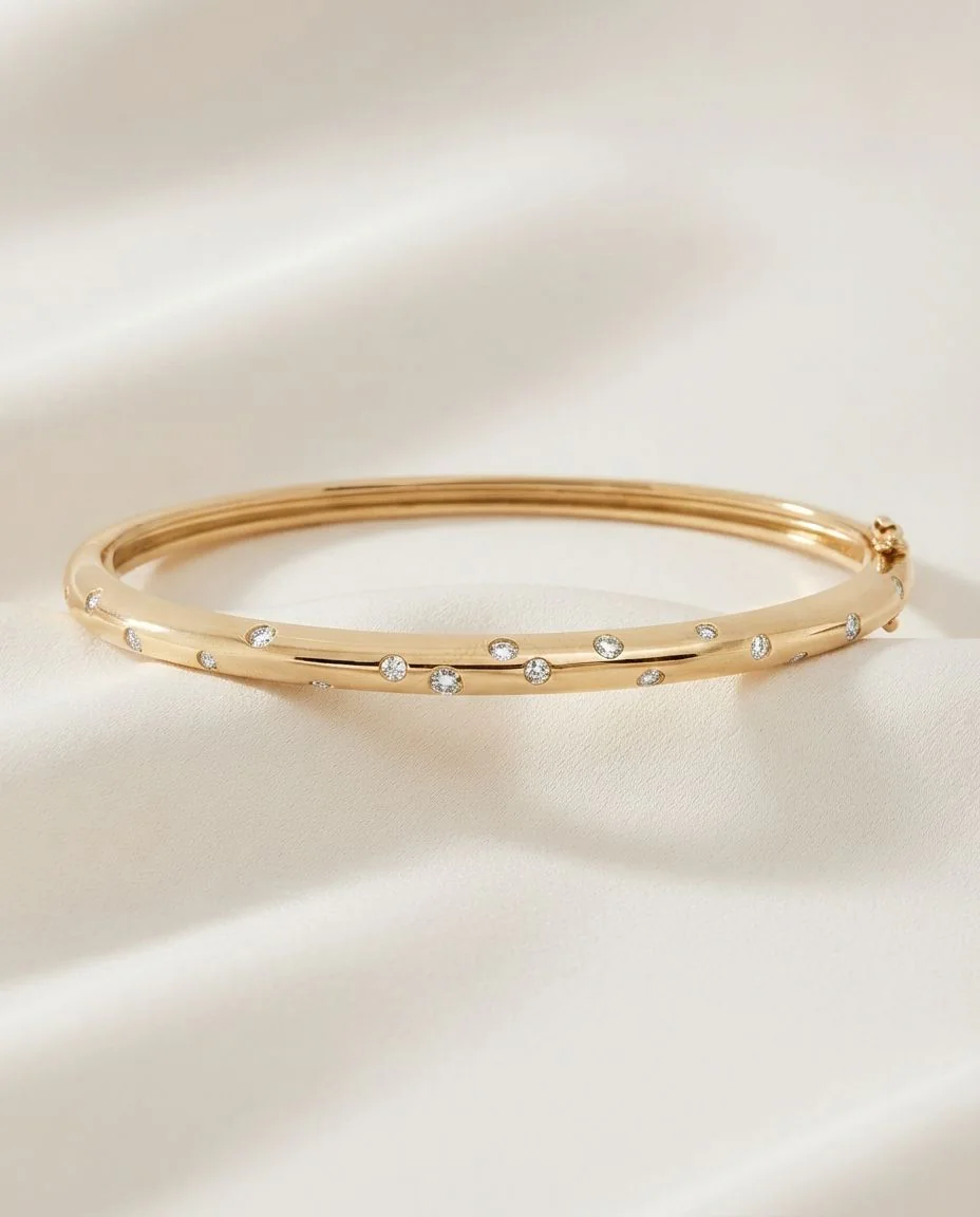 Armreif 18 Karat Gelbgold · drapiert