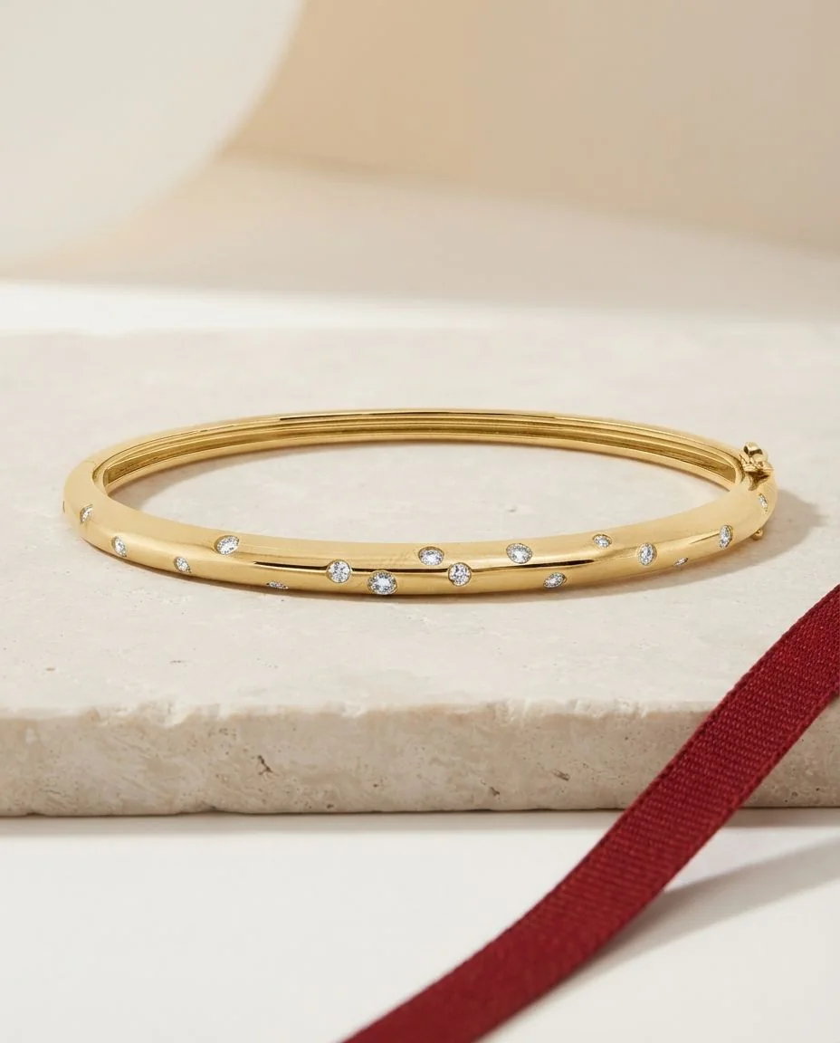 Armreif 18 Karat Gelbgold · drapiert