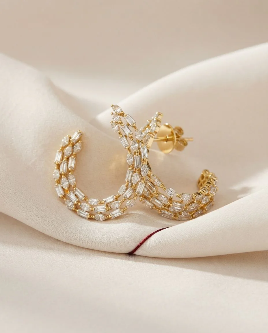 Ohrstecker 18 Karat Gelbgold · drapiert