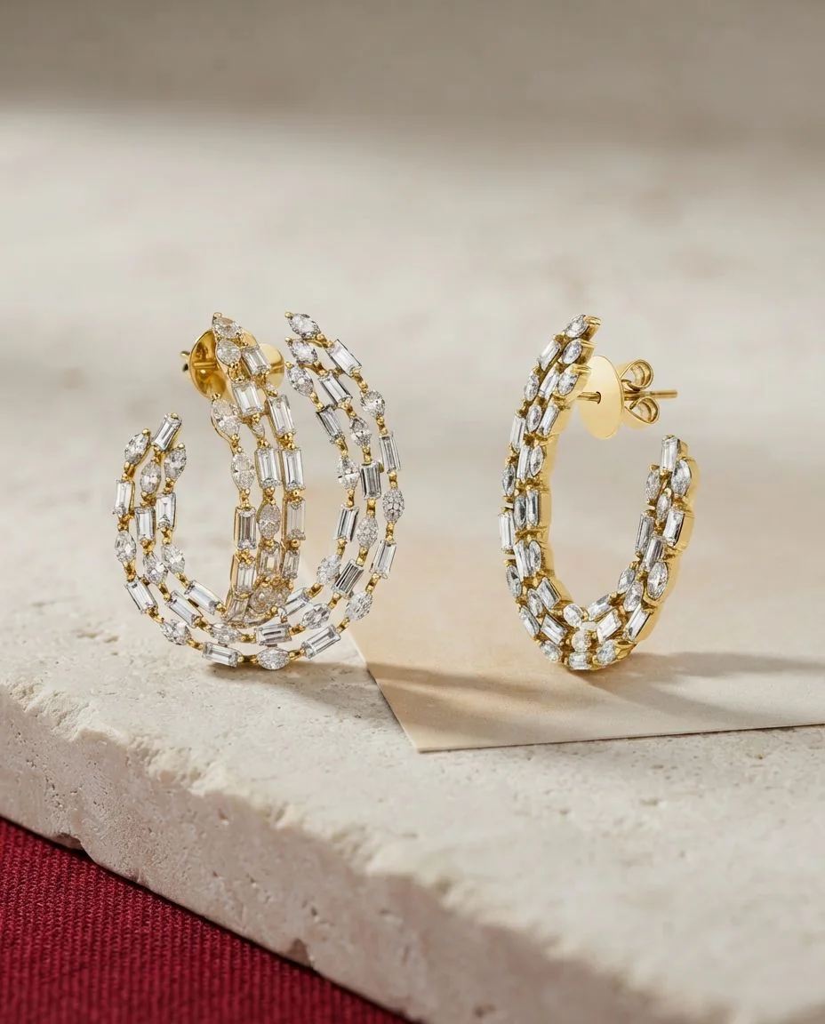 Ohrstecker 18 Karat Gelbgold · drapiert