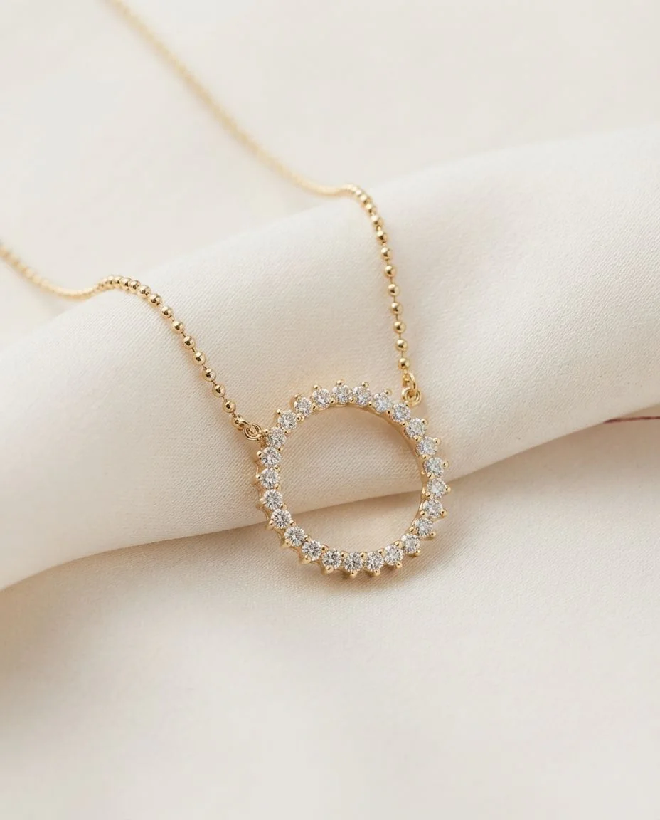 Collier 18 Karat Gelbgold · drapiert