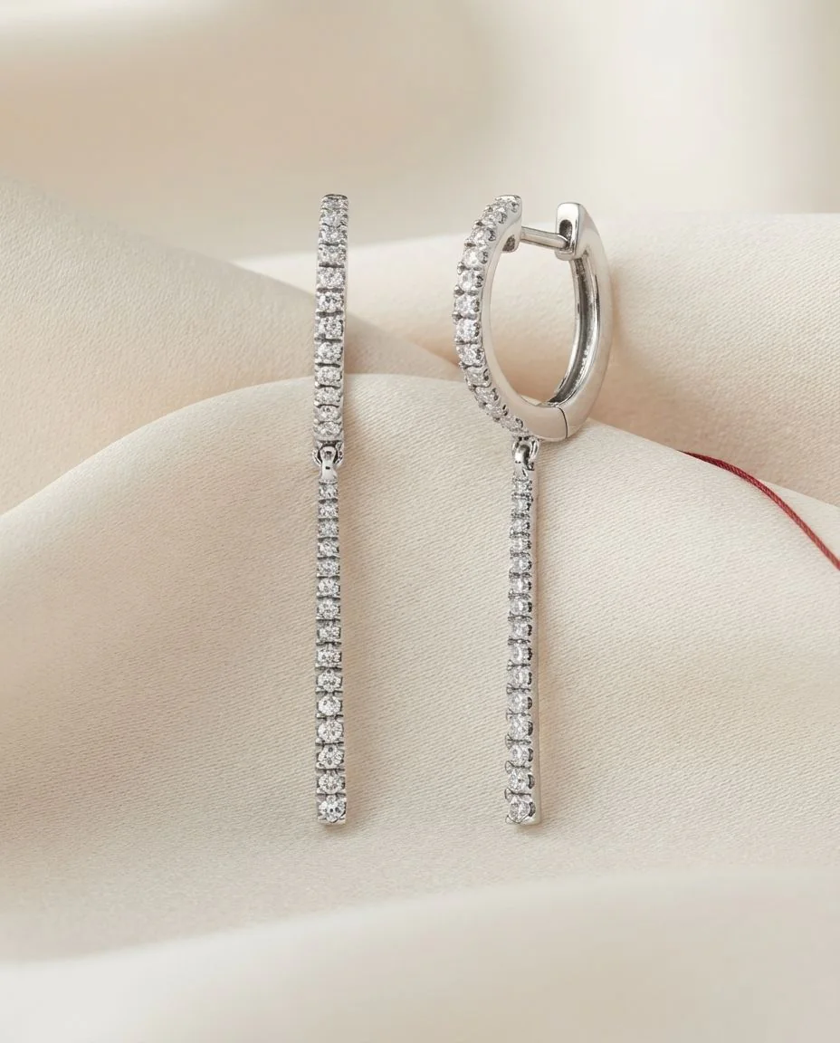 Ohrschmuck 18 Karat Gelbgold · drapiert