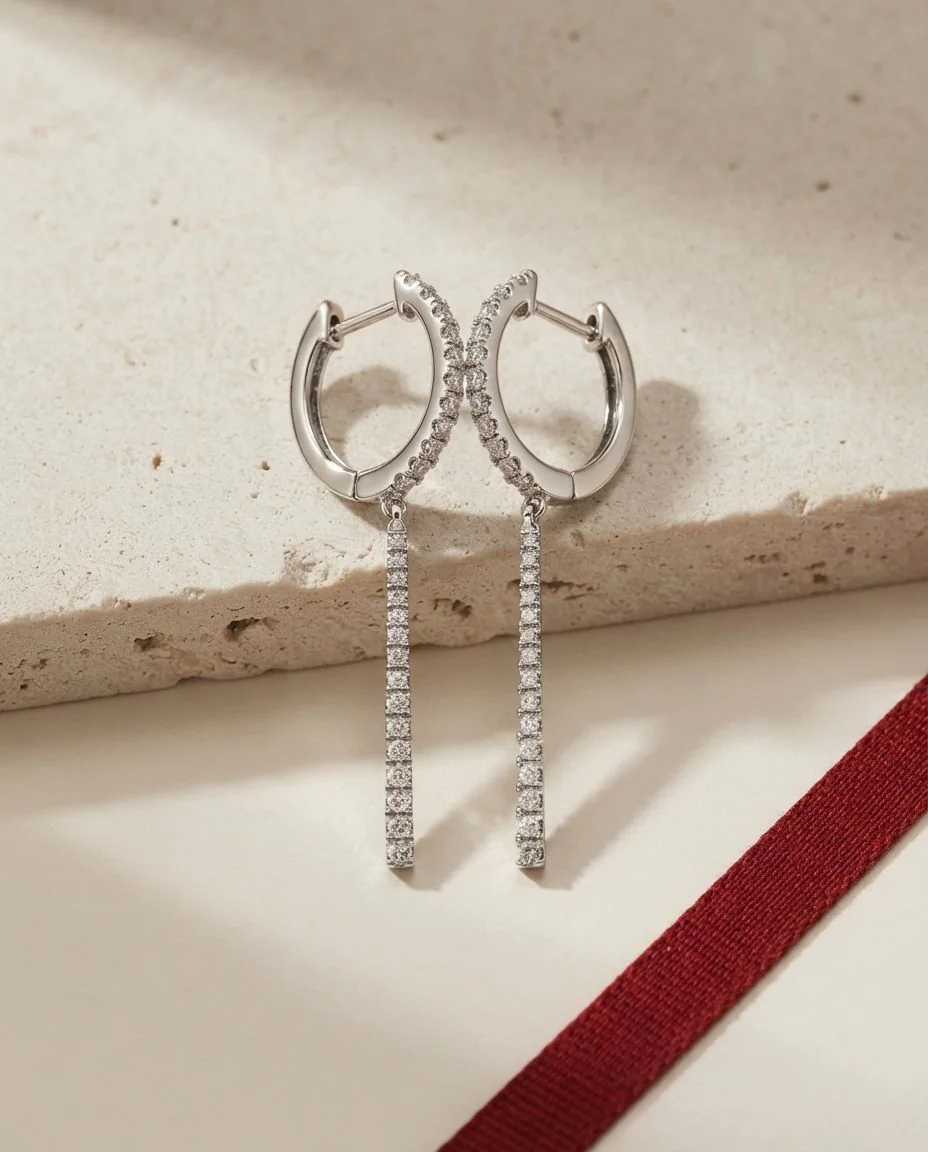 Ohrschmuck 18 Karat Gelbgold · drapiert